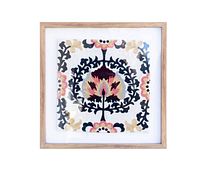 Front view of framed Uzbek embroidered textile artwork in blonde wood frame.