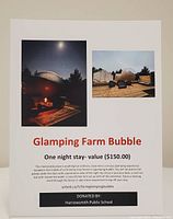 Printed sign with bubble tent images and voucher details