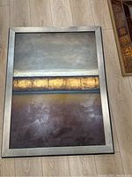 Front view of the large framed oil painting with abstract landscape gradient and signed by the artist.