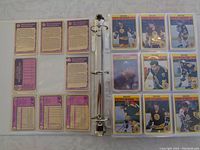 Front and back of 1982-83 OPC hockey cards featuring Boston Bruins players in plastic binder sleeve.