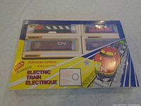 Full view of unopened Bachmann Northern Express HO scale electric train set in original packaging showing four cars.