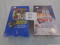 Photo of two sealed boxes of 1990-91 Pro Set Hockey Cards, one Series 1 and the other Series 2, showing front packaging and labels