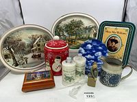 Lot showing all main items including trays, cookie jar, lotions, music box, plate, figurine, and pitcher.