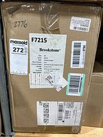 Box label showing Brookstone brand, Queen size, white color, style as Air Bed 24 inch, new in box.