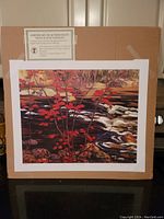 Front view of the unframed lithograph with certificate of authenticity on cardboard backing.