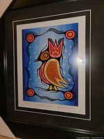 Framed fine art print showing Thunderbird Hawk artwork with vivid colors and signed by Brent Hardisty.