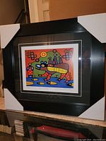 Framed fine art print titled "Bear Walker" by Christian Morrisseau, showing colorful stylized bear and bright background, with black frame and double mat.