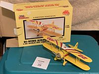 Limited edition box with Mac Tools branding and airplane model visible, showing the serial number 28 of 7,528.