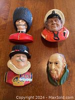 All four Bossons heads displayed on table: Beefeater, Royal Guard, Coast Guard, Fagin
