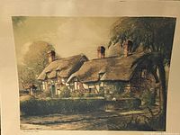 Old cottage scene picture showing a thatched roof cottage, water, trees, and greenery. The image is unframed and shows some age.