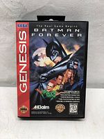 Front of the black plastic case for Sega Genesis Batman Forever game with cover art and logos visible.