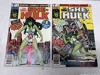 Photo showing front covers of The Savage She-Hulk #1 and #2 comics side by side, with full titles and cover art visible.