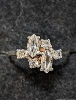 Top view of silver ring showing detailed stone arrangement.