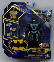 Sealed DC Comic Batman BAT-TECH 1st Edition action figure in blister packaging with label details and accessories shown.