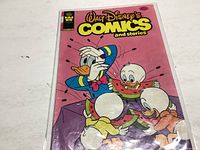 Photo of the front cover of Walt Disney's Comics and Stories issue 479 featuring Donald Duck and nephews.