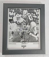 Framed 8x10 black and white photo of Glenn Blackwood in Miami Dolphins uniform showing action pose