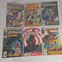 Twelve vintage Deathlok comic books with various cover scenes and titles from Marvel's Deathlok series.