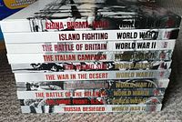 Stack of 10 hardcover Time Life World War II books showing titles on spines.