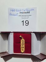 Front view of pendant in red jewelry box