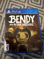 Front cover of the PS4 game case featuring Bendy the cartoon character and title.