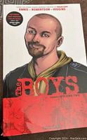 Front cover of The Boys Omnibus Volume Two graphic novel with title and illustration of a bald man on white background.