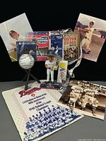 Full set of Boston Braves and Red Sox memorabilia items arranged on black background