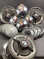 Group shot of all 15 hubcaps arranged