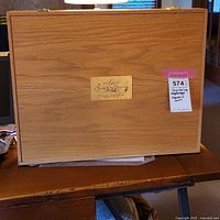 Oak rectangular presentation chest with brass plaque on top showing the title 'The Great Sailing Ship Engravings'