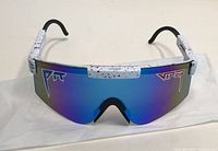 Front view of new V-Tet men’s sunglasses with blue mirrored lens and white speckled frame with logos on lens.