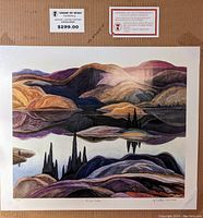 Photo of the limited edition print 'Mirror Lake' showing vibrant colors and detailed landscape design, with visible numbering 7/777.