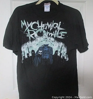 Full view of black My Chemical Romance t-shirt showing graphic print with band name and band member figures.