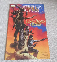 Front cover of the comic book showing characters and title 'Stephen King The Dark Tower The Long Road Home'.