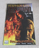 Front cover of the comic showing Stephen King The Stand Soul Survivors, Marvel 3 of 5, with characters including a man and woman surrounded by flames.