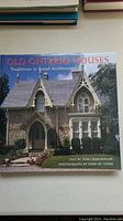 Front cover photo of the book showing a historic house and the title 'Old Ontario Houses: Traditions in Local Architecture' with author and photographer names.