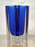 Front view showing scalloped star rim and Iittala maker’s sticker