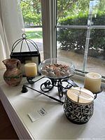 View of lot on window ledge showing all items included and condition details