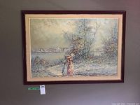 Front view of the framed unsigned impressionist oil painting showing two women near a lake with tree in foreground and village background.