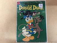 Cover photo of 1954 Donald Duck #37 comic book inside protective plastic.