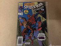 Comic book cover showing Spiderman and another character in action with Marvel logo
