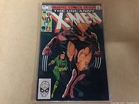 Front cover of The Uncanny X-Men issue #173 comic book, showing title, issue number, price, and characters Wolverine and Rogue in action.