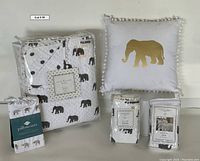 Full view of packaged quilt, pillowcases, shams, and decorative pillow