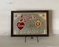 Front view of the vintage Stroh's bar mirror with New York design showing full frame and mirror graphics.