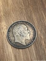 Obverse side of the 1908 UK Half Crown coin showing King George V profile.