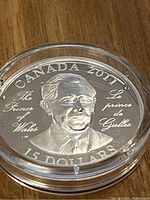 Obverse side showing Prince Charles portrait, inscriptions: Canada 2011, The Prince of Wales, 15 dollars.