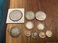 All 10 coins laid out on table