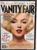 Close-up of the Vanity Fair magazine cover showing Marilyn Monroe's face and text indicating the special collector's edition 25th anniversary issue dated October 2008.