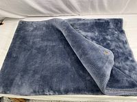 Full view of the unfolded plush fleece blanket showing texture and color.