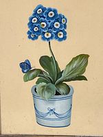Close-up photo of the oil painting showing blue auricula flowers, green leaves, butterfly, and painted pot details.