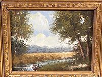 Front view of the river scene oil painting with trees, showing the full artwork and frame.