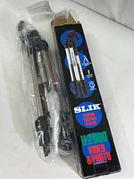 SLIK U2000 tripod in original box with printed branding and product image, wrapped in protective plastic.
